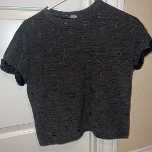 Black shortsleeved ripped shirt